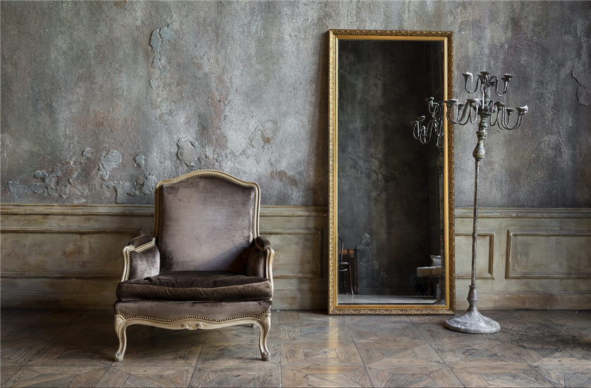 Antique mirror and chair side-by-side